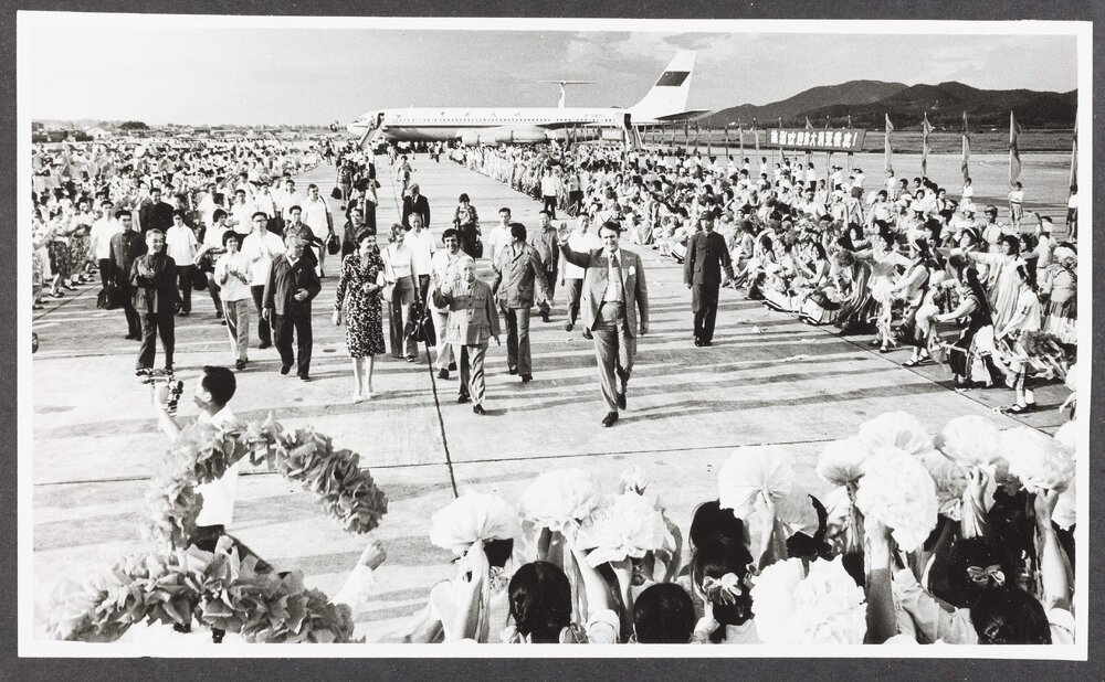 [Malcolm and Tamie Fraser and others at an airport in China]