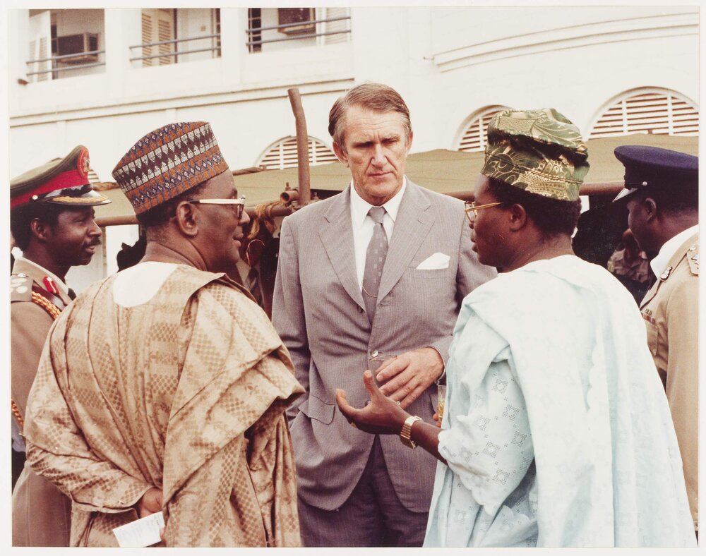 [Malcolm Fraser with two men in Nigeria or Zambia]