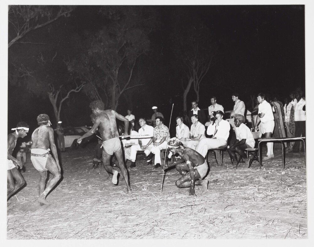 [Malcolm Fraser and others watching a traditional dance by Aboriginal Australian men during a visit to the Northern Territory]
