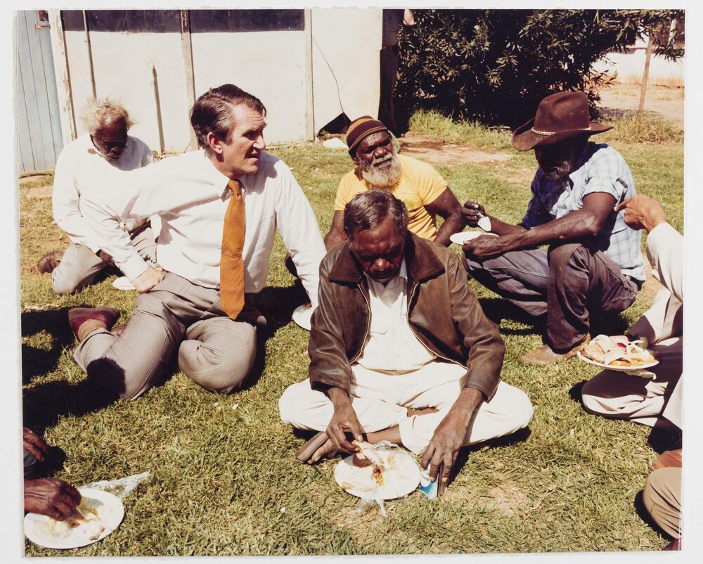 [Malcolm Fraser and Aboriginal Australian men eating lunch during a visit to the Northern Territory. Annotated with "Do not use"]