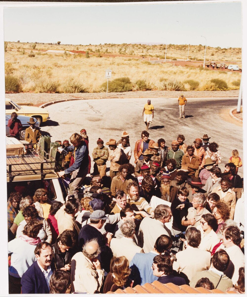 [Malcolm Fraser in a crowd of people during a visit to the Northern Territory]