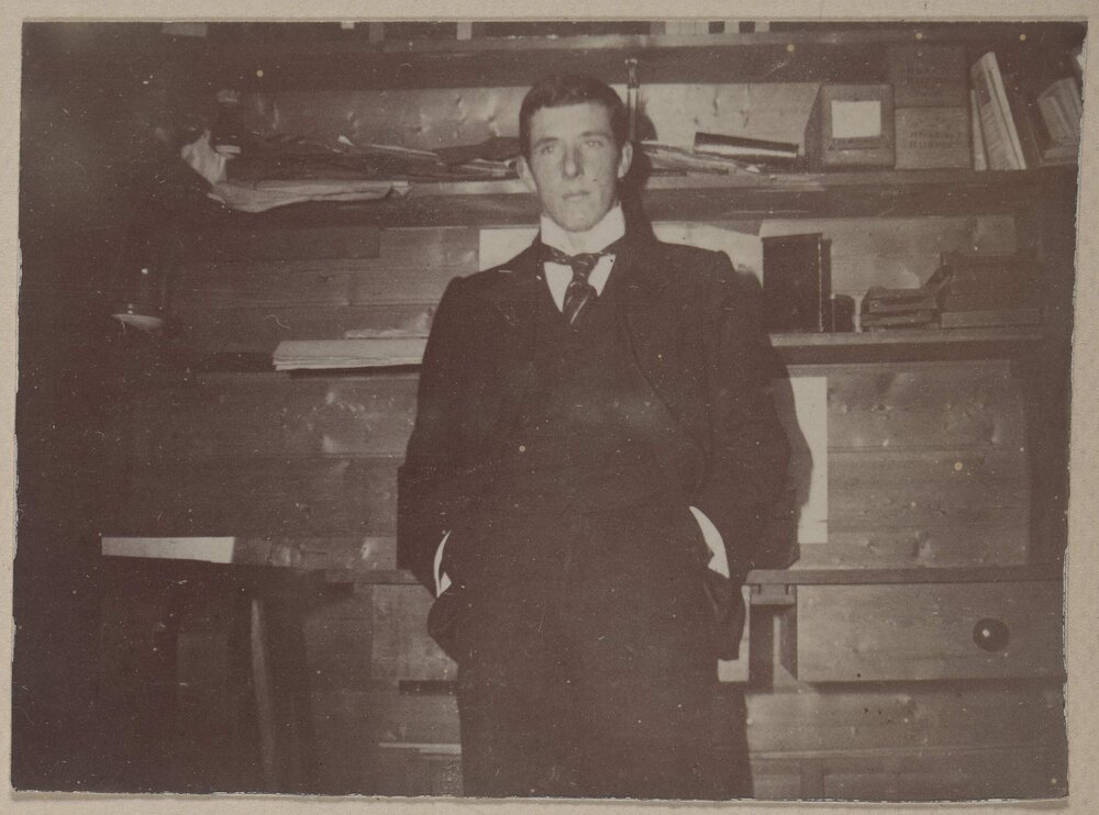 [Man in suit and tie]