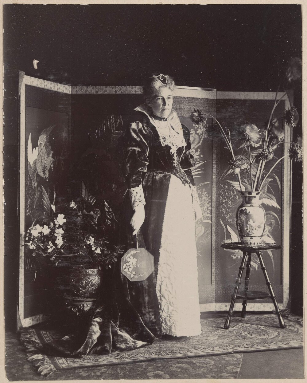 [Woman wearing formal dress] 