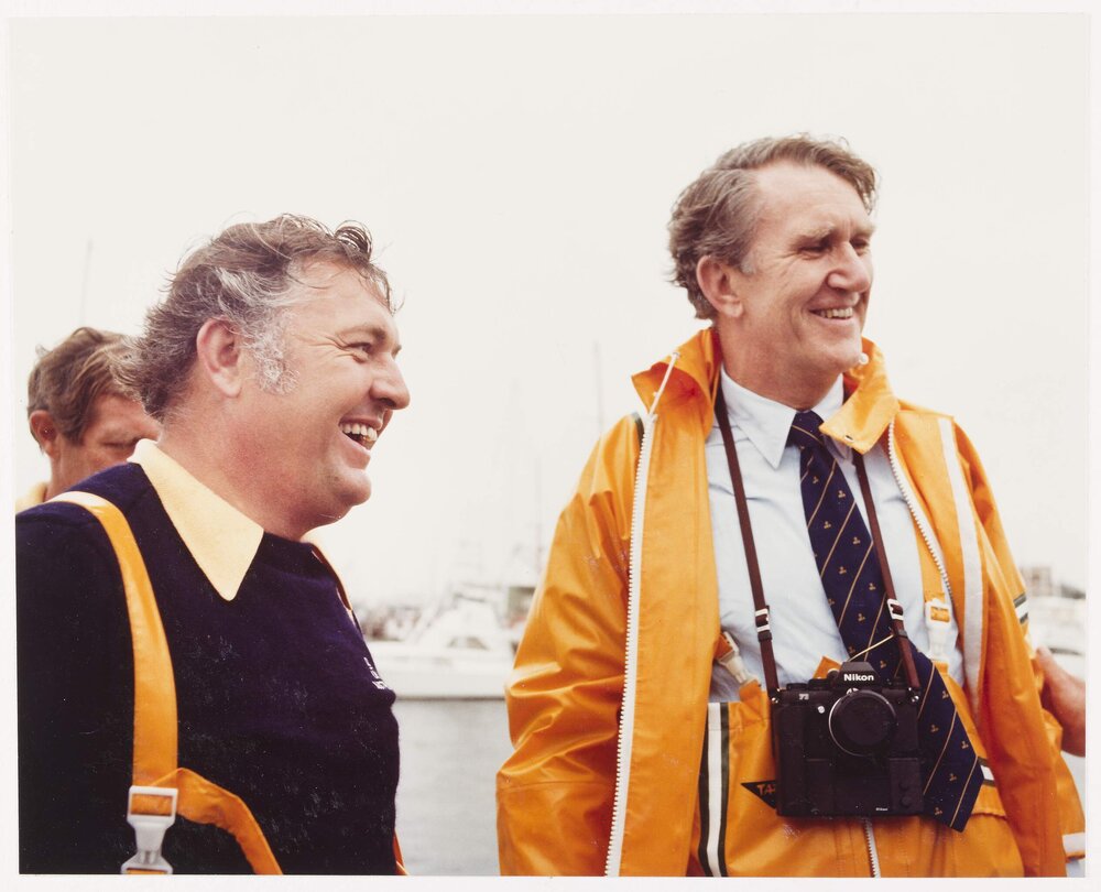 [Malcolm Fraser in yachting gear with unidentified man]