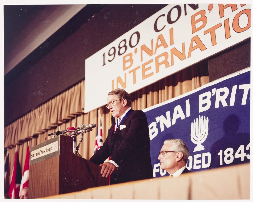 [Malcolm Fraser speaking at a reception for the B'nai B'rith medal, with Jack Spitzer, International President, seated]