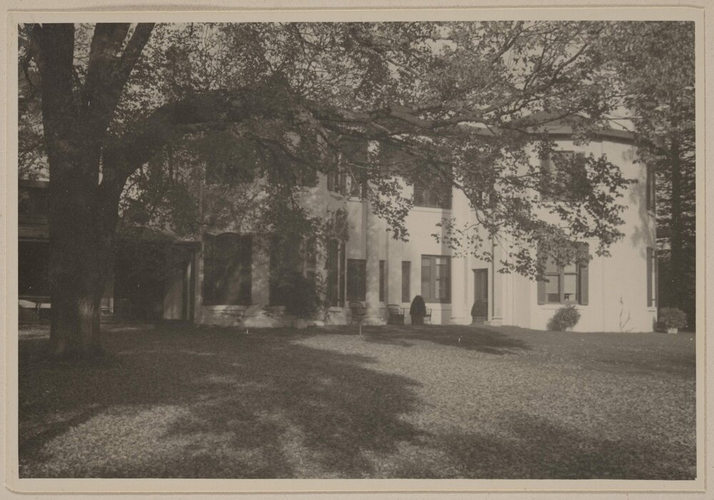 [External view of Miegunyah conservatory and the twin columns stretching from terrace to roof] 