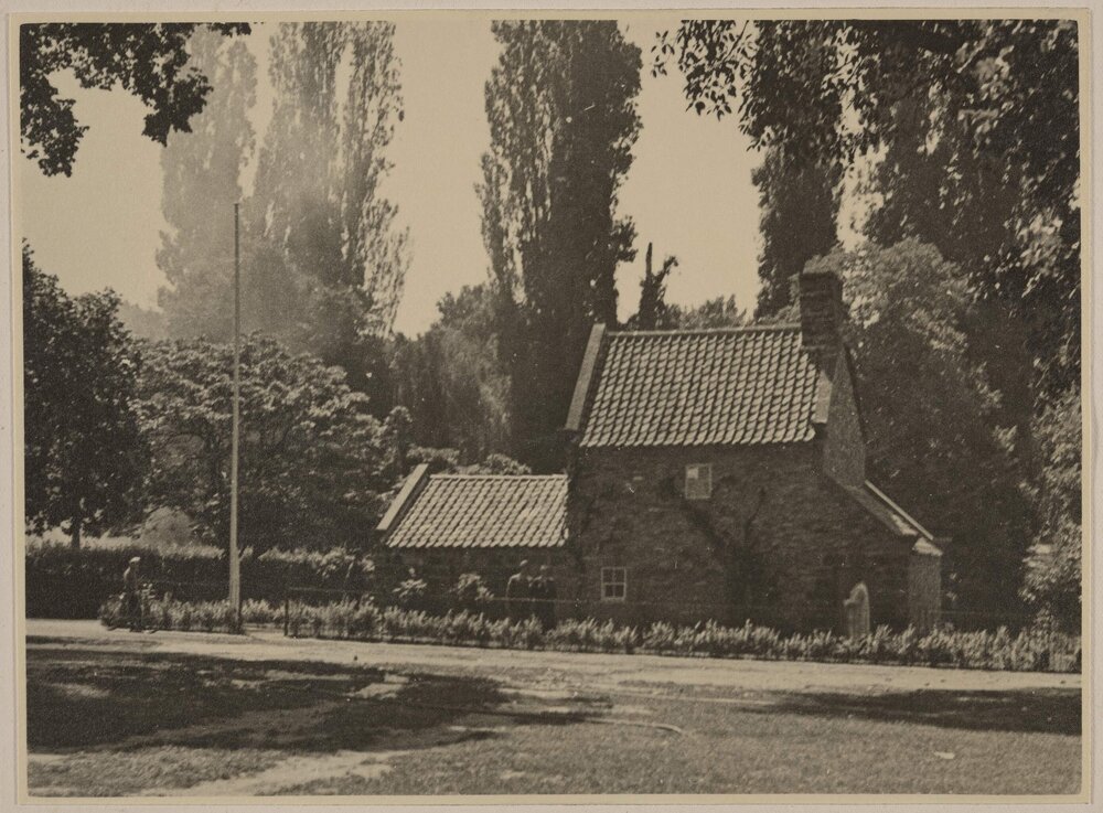 [External side rear view of Cooks' Cottage, Fitzroy Gardens, Melbourne]
