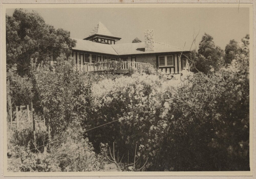 [View looking up at Westerfield balustraded deck from rear garden]