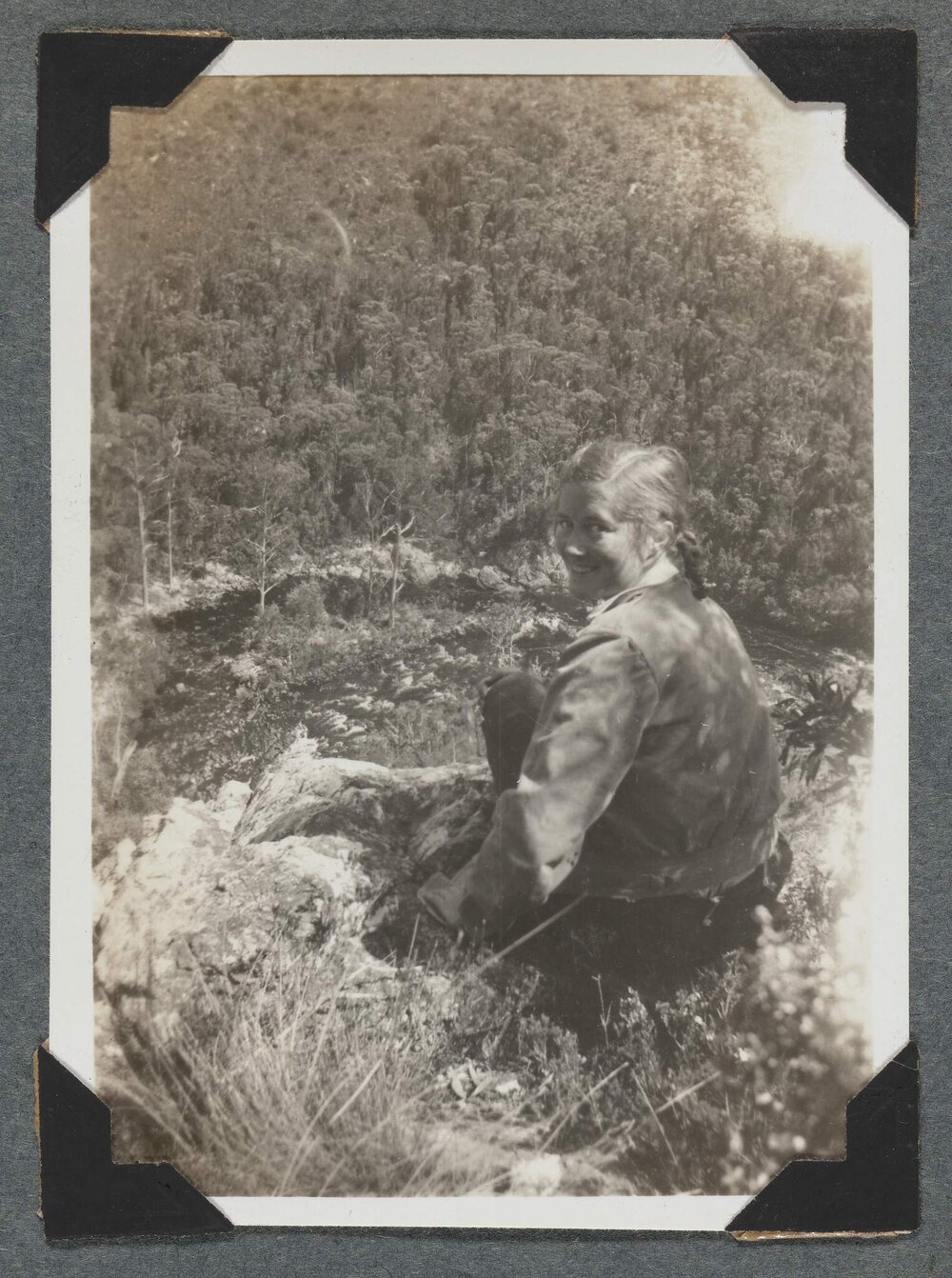 [Mountaineering Club Tasmania trip - woman seated in a foreground]