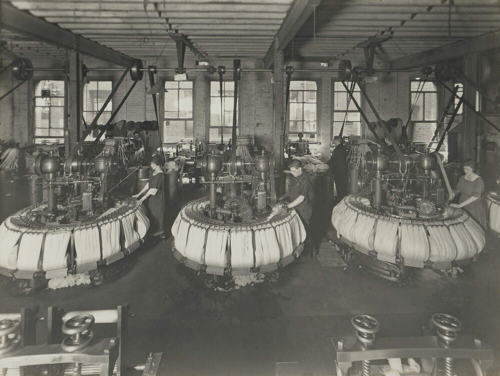 Women operating wool combing machinery in the No.1 Combing Room at Foy and Gibson Pty. Ltd. Gibsonia Mills in Collingwood, Victoria.