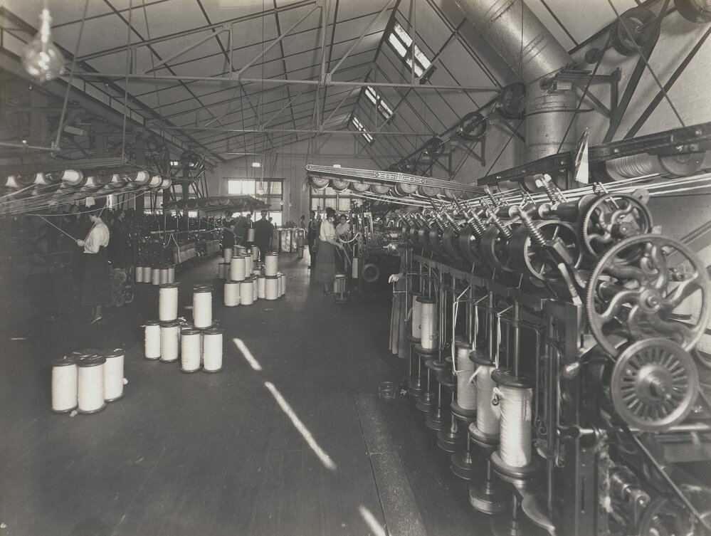 Women operating wool processing machinery at Foy and Gibson Pty. Ltd. Gibsonia Mills in Collingwood, Victoria.