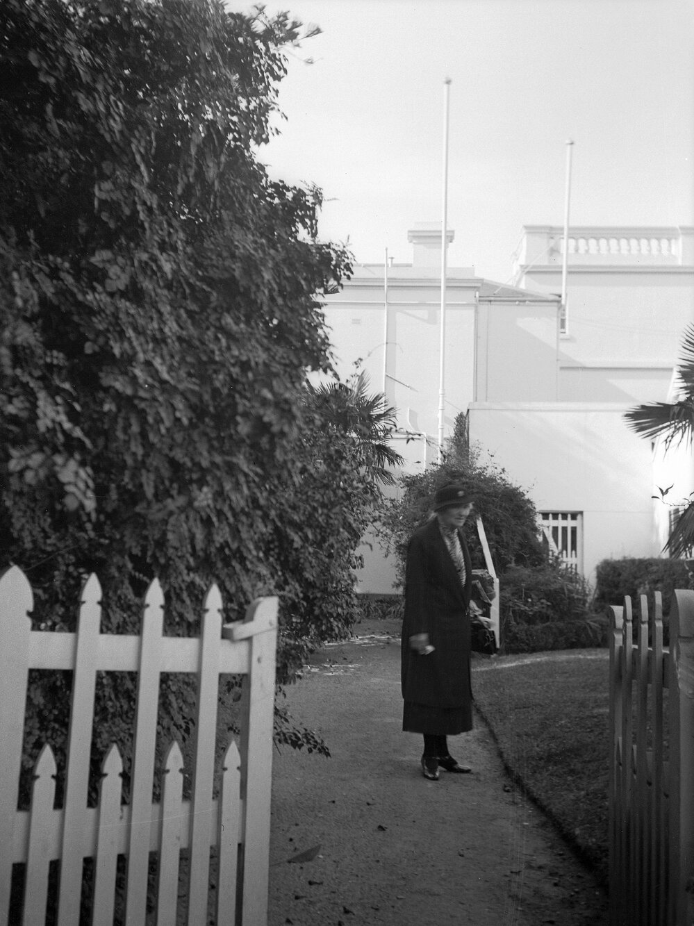 Elderly woman in front of the house at 'Como'