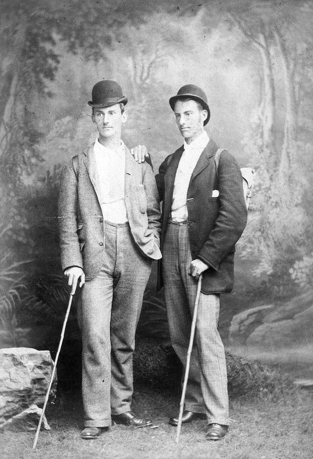 Full-length photo of two young men, standing