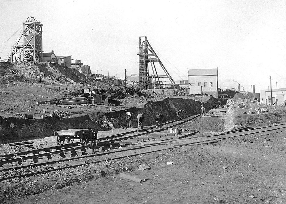 Laying siding to New Mill.