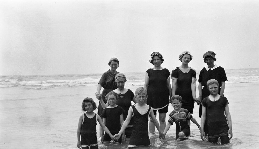 Group of woman and children at a beach