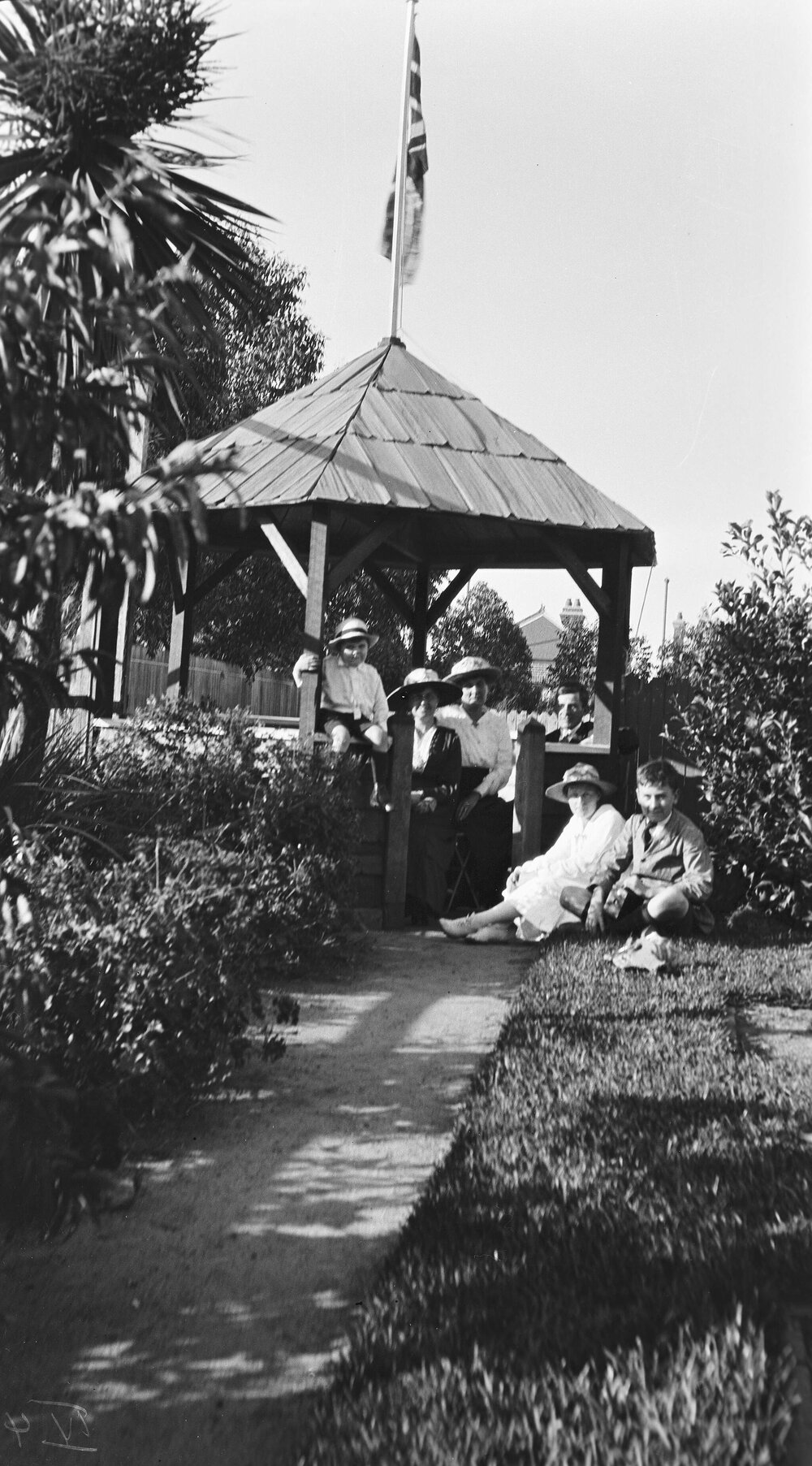 People sitting in a gazebo