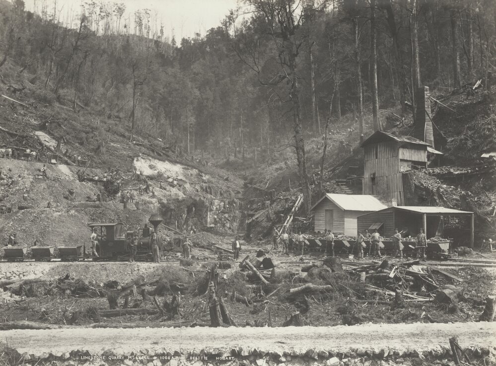 A group of workers at a limestone quarry at Mount Lyell, Tasmania.  Part of the operations of Mount Lyell Mining and Railway Co. Ltd.