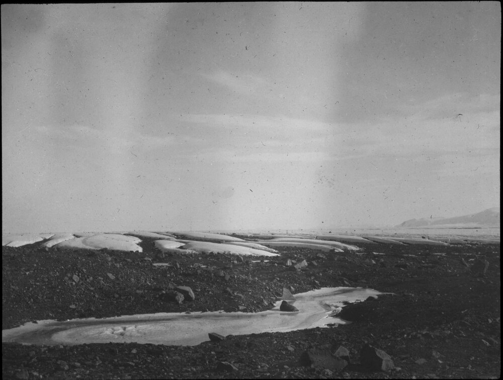 Snow covered rocky ground