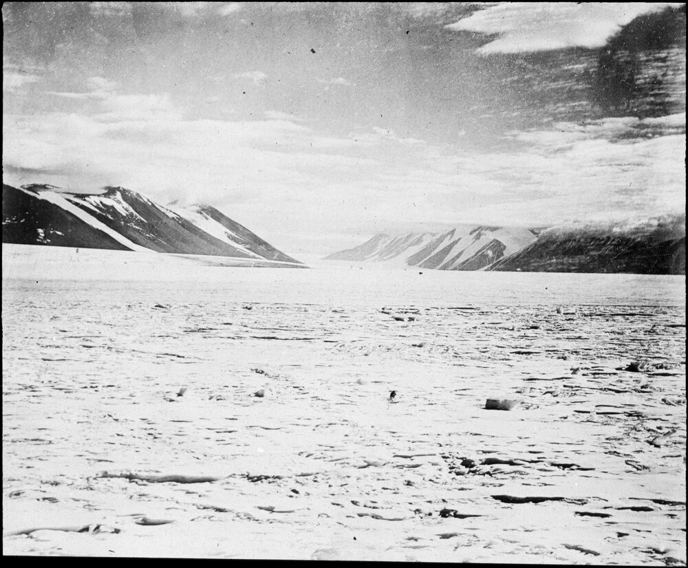Frozen lake and mountains