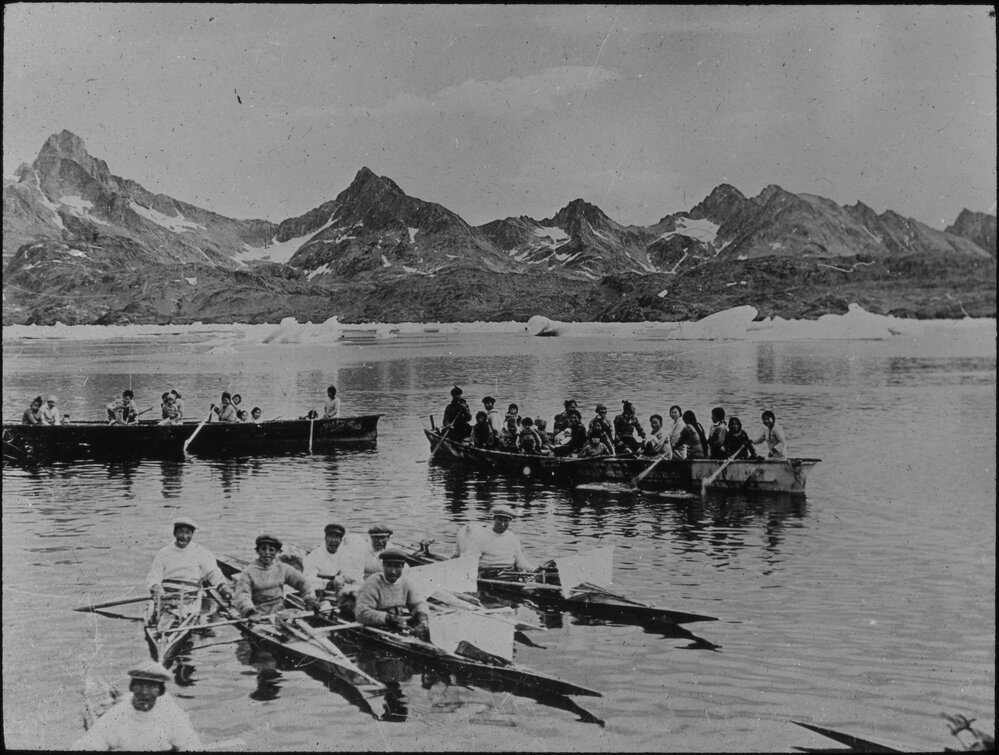 Inuit, kayaks and umiaks in Angmagssalik area