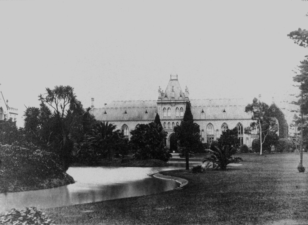 The National Museum with lake in foreground, University of Melbourne.