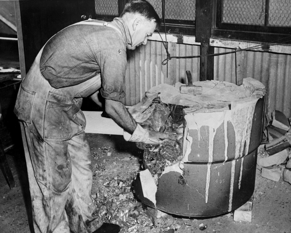 University optical research.  Copy negative of opening commercial pot of optical glass.  ACI.