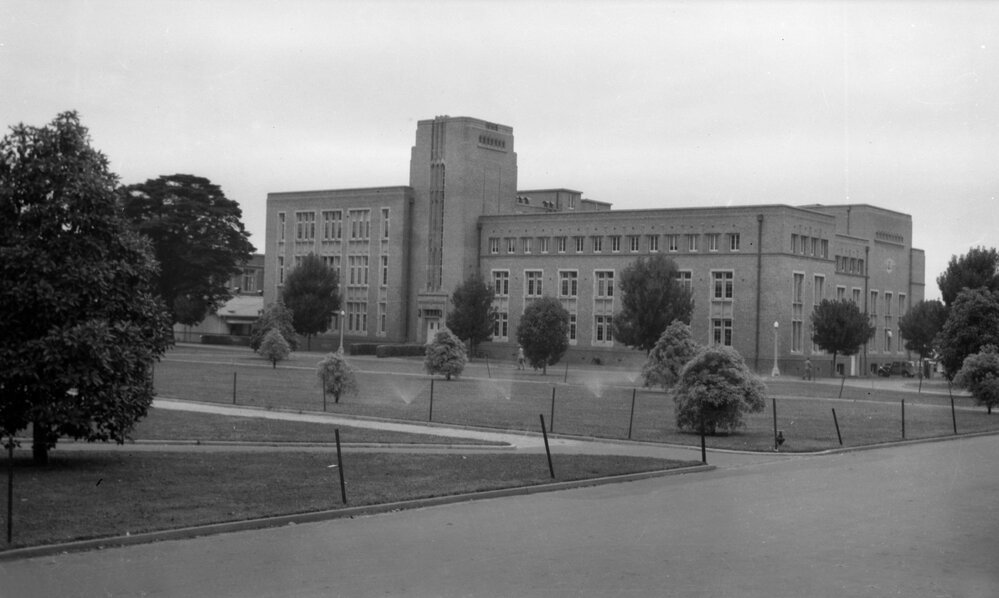 University building under construction.  Chemistry building and Union lawns.