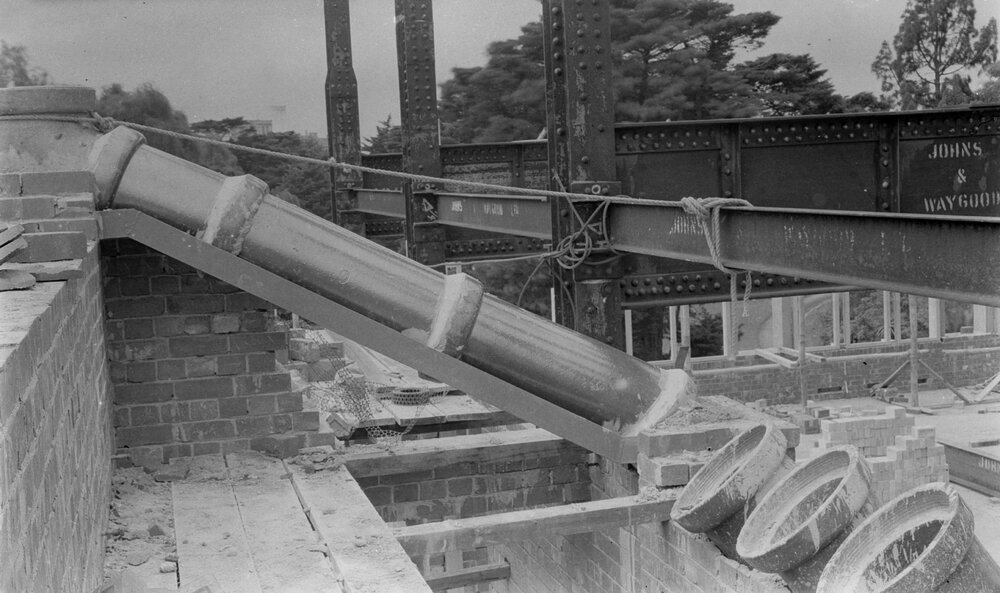 University building under construction.  Fume ducts 2nd to 3rd floor.