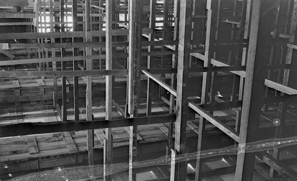 University building under construction - inside scaffolding.