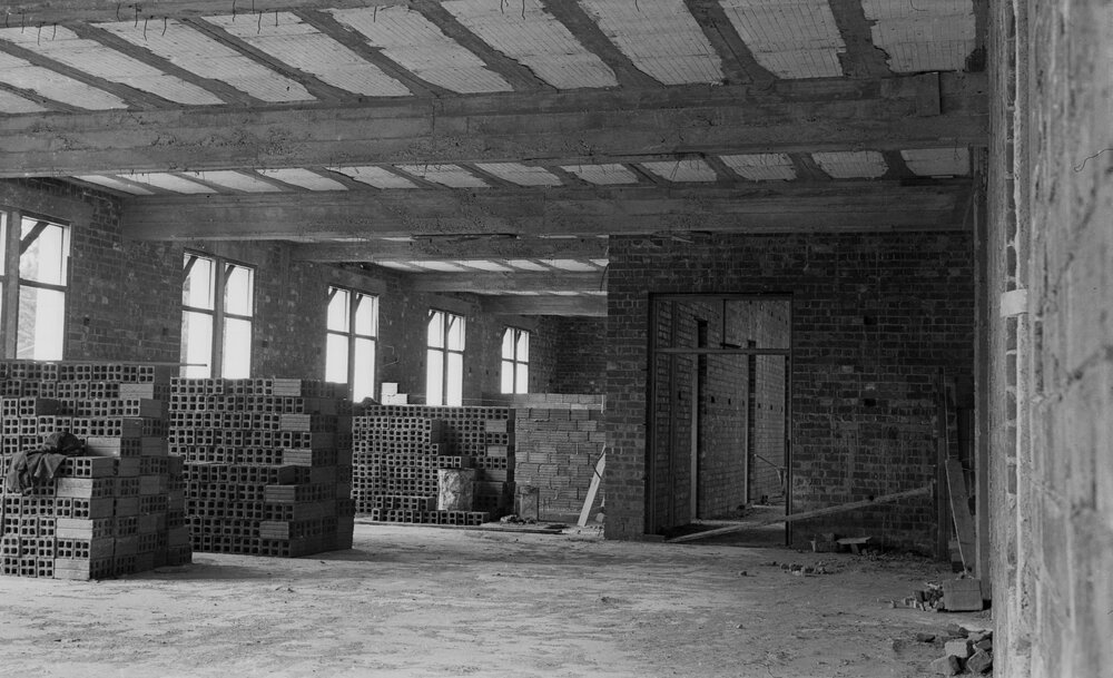 University building under construction.  Romm 13 looking East.