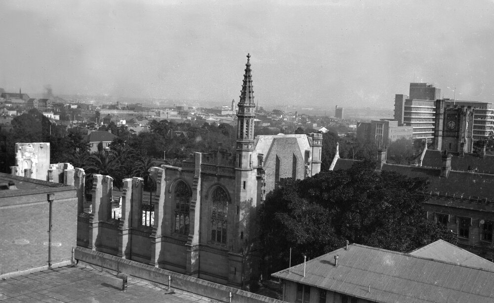 University building under construction.  Old Wilson Hall being demolished.