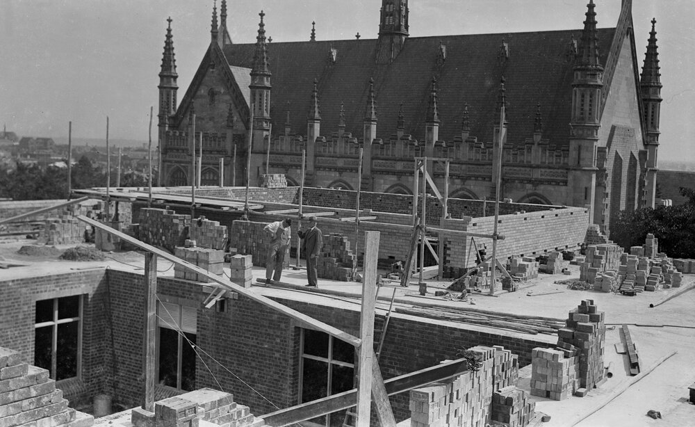 University building under construction.  Looking across Cuming Theatre light well, Senior Theatre to Wilson Hall.