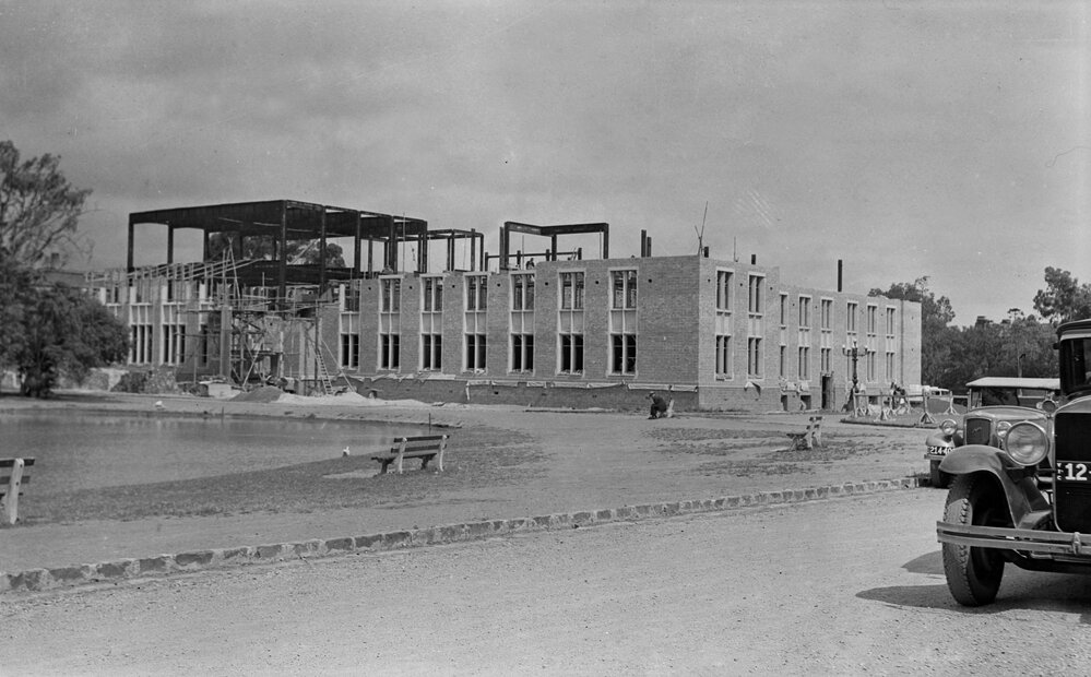 University building under construction.  Chemsitry &amp; part of lake.
