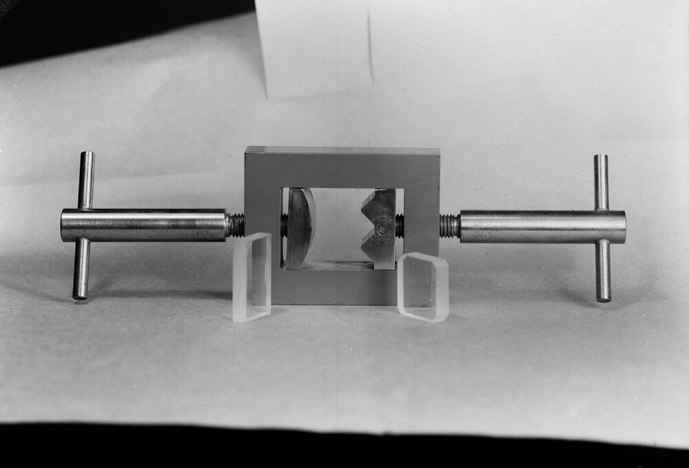 University optical glass research. Apparatus for demonstrating strain in glass.