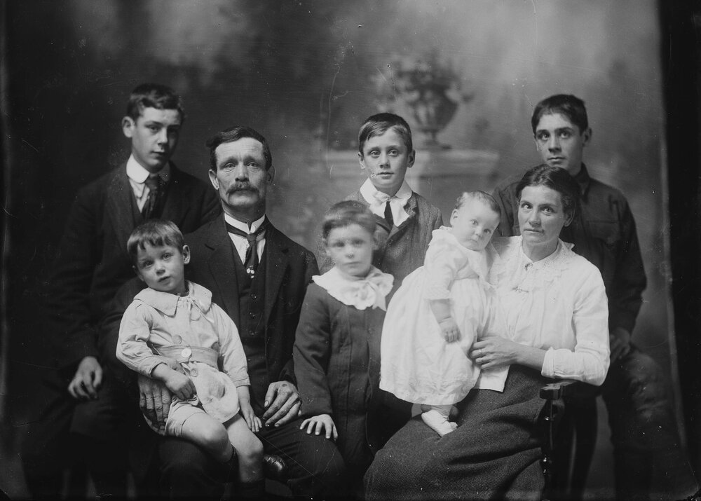 Studio portrait of an unidentified family group.