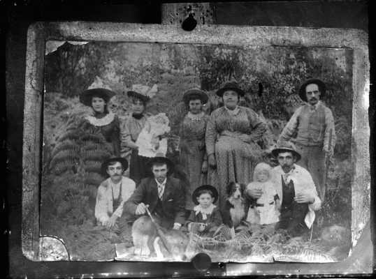 An unidentified group of people in a forest environment.