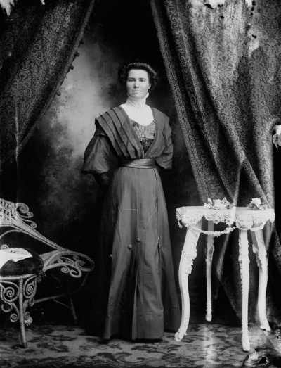 Studio portrait of  Mrs. Watts.