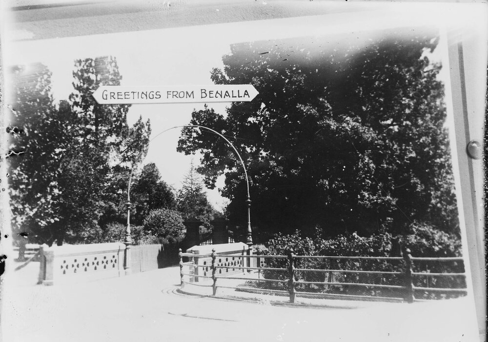 An arched bridge at an entrance to the Benalla Botanical Gardens.
