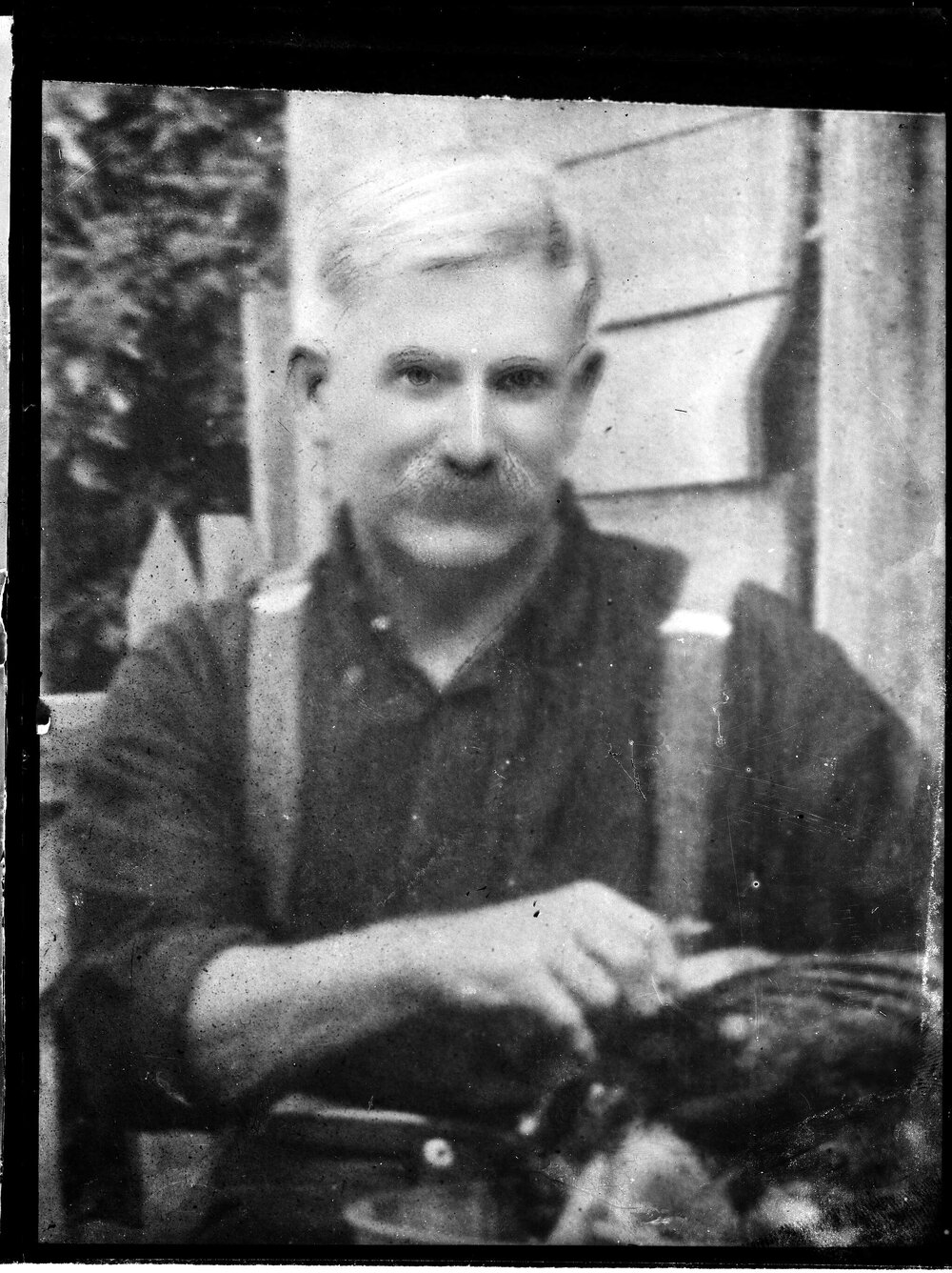 An unidentified man wearing braces.