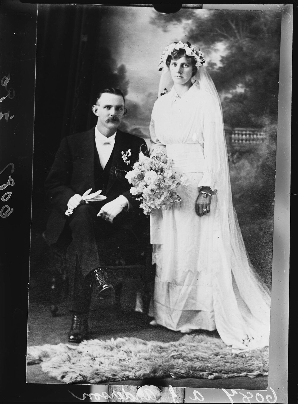 Studio portrait of an unidentified wedding couple.