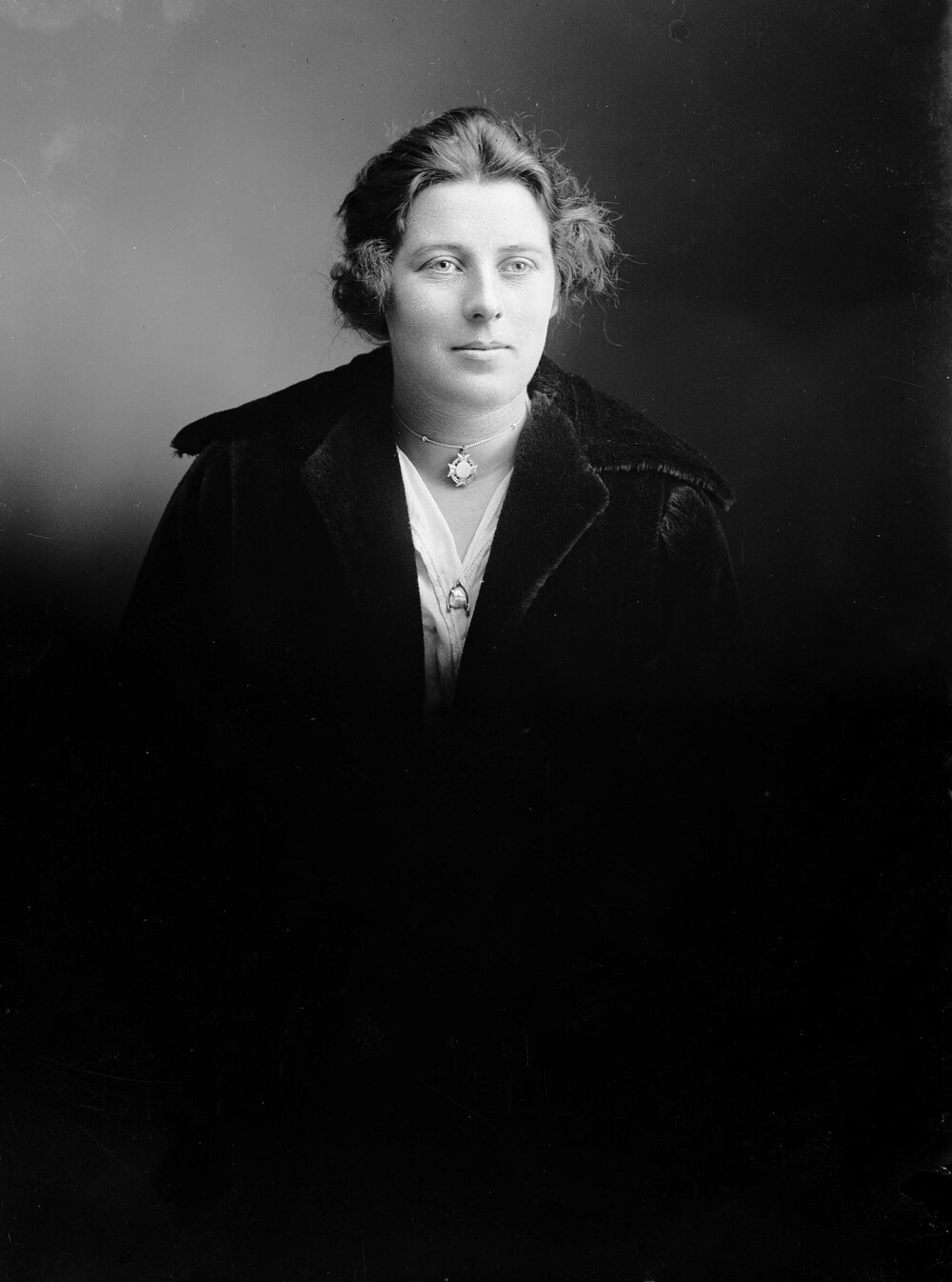 Studio half-length portrait of an unidentified woman.