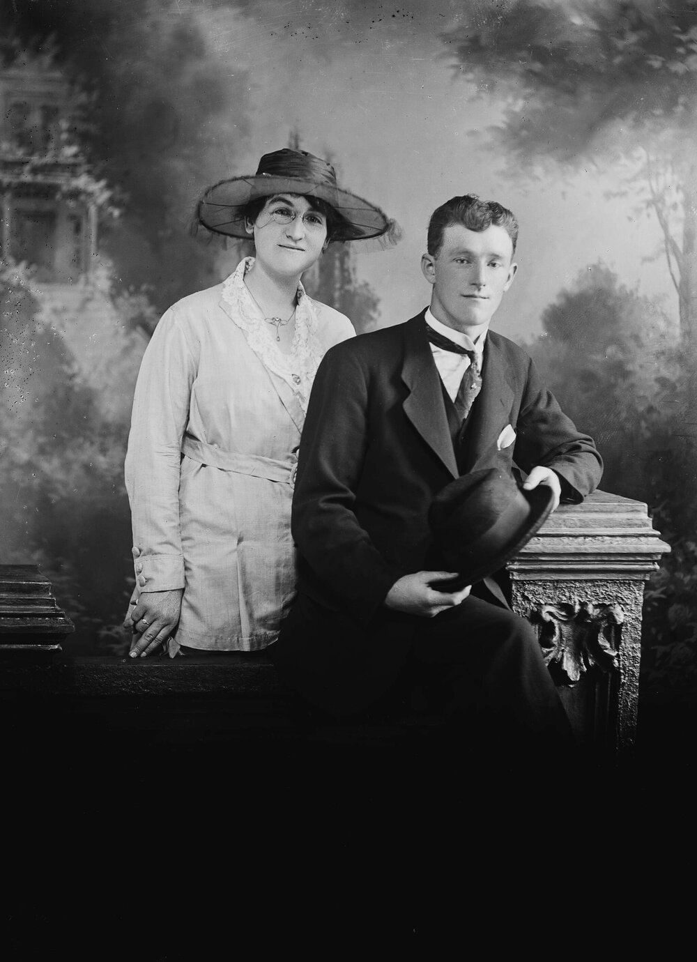 Studio portrait of a young man and woman.  Family name Gravenerall.