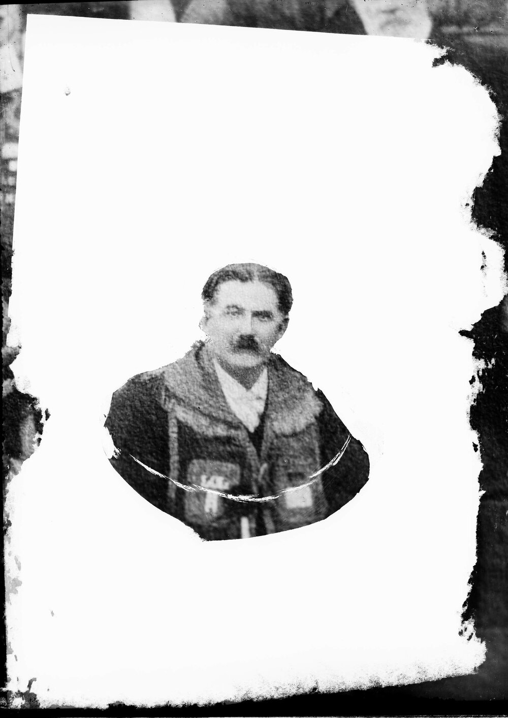 A head and shoulders view of an unidentified man.