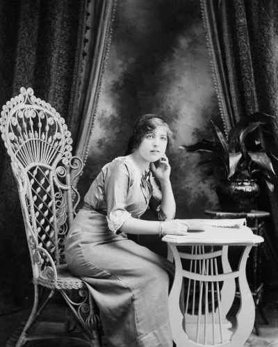 Studio portrait of Miss M. Masson.