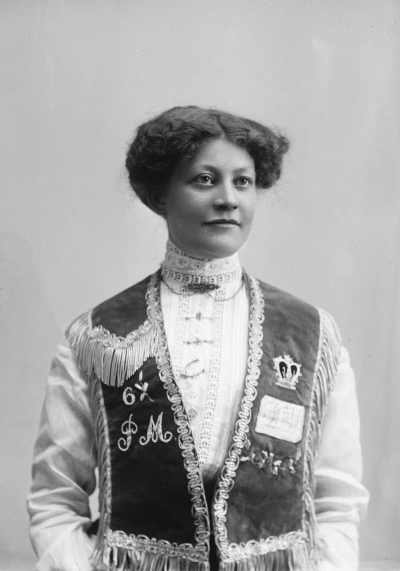 Portrait of Miss Lindsay wearing an embroidered vest of unknown symbolism.