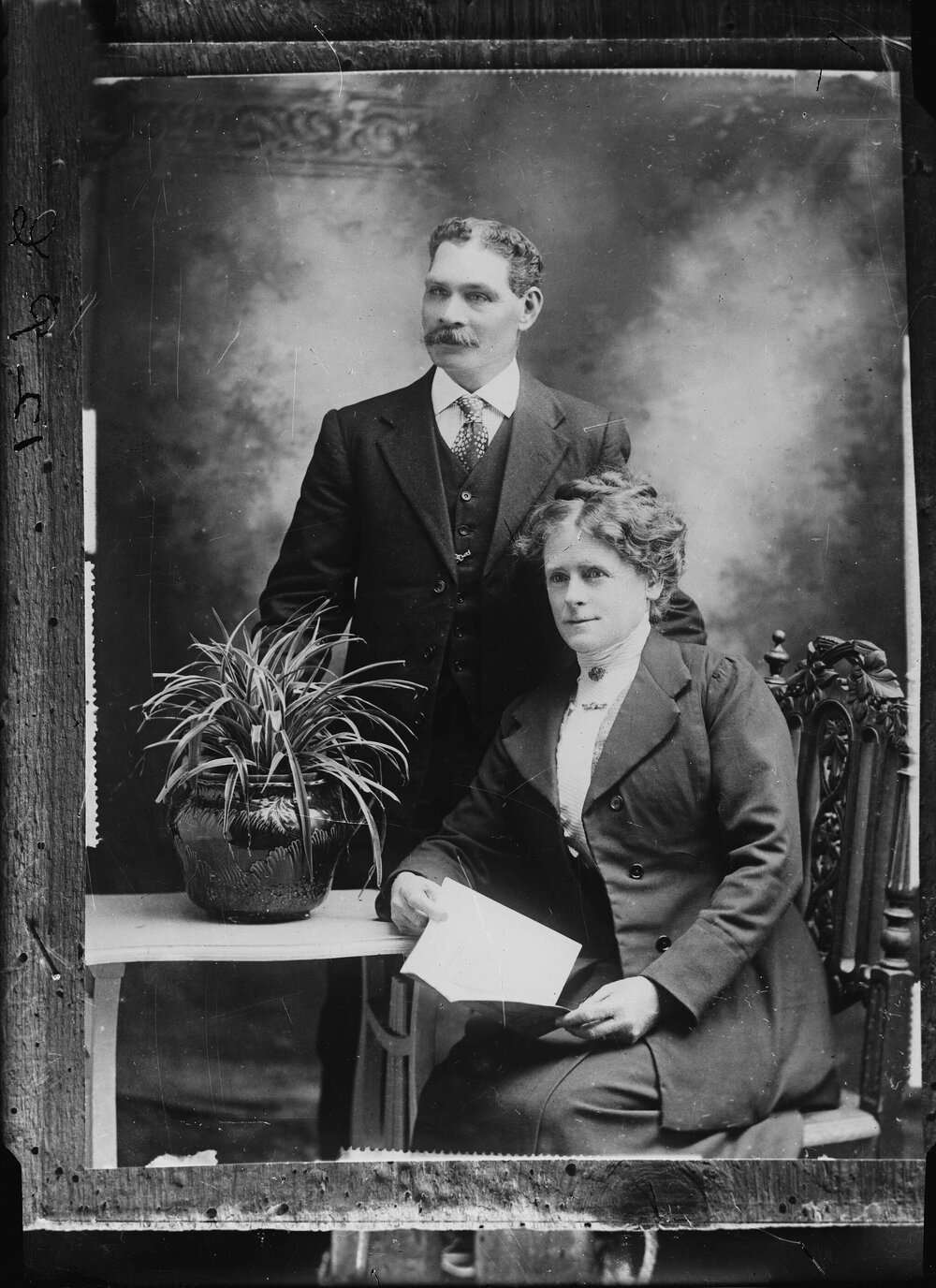 Studio portrait of a woman and a man.