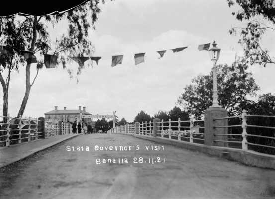 The concrete road bridge at Benalla adorned with bunting  and signage to welcome the Governor of Victoria.