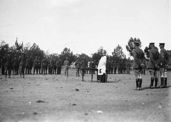 A clergyman addressing troops at a military ceremony in Benalla.