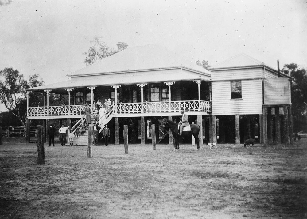 A single storied elevated timber house in a rural environment.