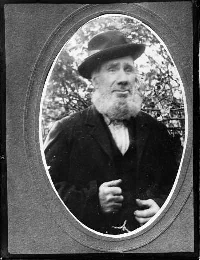 Portrait of an unidentified man with mutton chops whiskers.